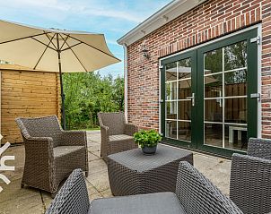 Luchtfoto van ZE646 vakantiehuis in het groene landschap van Grijpskerke, Zeeland.