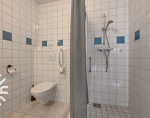 Kippenhok bij vakantiehuis ZE135 in Grijpskerke, Walcheren, omgeven door groen.