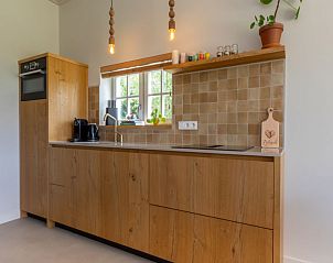 Keuken met moderne apparatuur in Vakantiehuis De kleine Pionier, Grijpskerke, Walcheren, Zeeland.