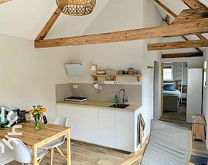 Gezellig terras van vakantiehuis ZE1556 in Gapinge, Walcheren met zitplaatsen.