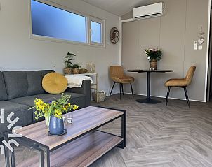 Stijlvolle woonkamer in vakantiehuis ZE1415, Gapinge, Walcheren, Zeeland.