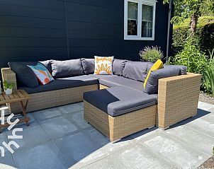 Gezellige zithoek in de woonkamer van ZE1415, Gapinge, Walcheren, Zeeland.