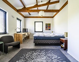 Overzicht van de tuin bij VZ1127 Vakantiewoning in Koudekerke, Walcheren.