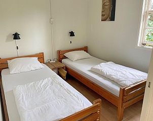 Trap naar bovenverdieping in VZ037 Vakantiehuisje Koudekerke-Dishoek, Walcheren, Zeeland.