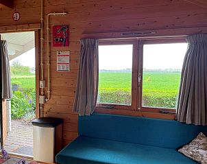 Uitzicht vanuit VZ2319 Natuurhuisje in Koudekerke-Dishoek op uitgestrekte velden in Walcheren, Zeeland.