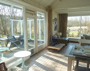 VZ1132 Vakantiehuis in Koudekerke, zonnige veranda met tuinzicht in Dishoek, Walcheren, Zeeland.