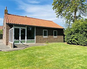 VZ641 Vakantiehuis in Koudekerke-Dishoek, Walcheren, met zonnig terras en groene omgeving.
