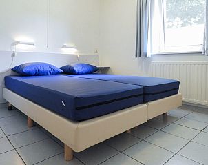Slaapkamer met tweepersoonsbed in VZ641 Vakantiehuis Koudekerke-Dishoek, Walcheren.