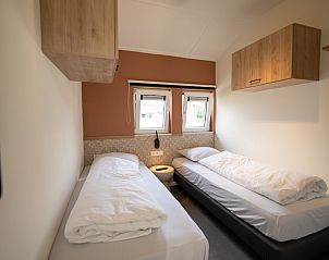 Entspannen Sie sich in der luxurisen Sauna der Villa Luxe 6 Wellness, einem Ferienhaus in Breskens, Zeeuws-Vlaanderen, ideal fr ultimative Entspannung.