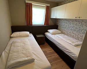 Overdekt terras in VZ807 Vakantiehuis Breskens, ideaal voor barbecuen in Zeeland.