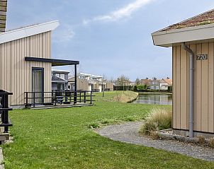 Detached house in Breskens overlooking a pond, located in green Zeeuws-Vlaanderen, ideal for a relaxing vacation.