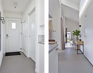 Bright entrance to the Detached house in Breskens, vacation home in Zeeuws-Vlaanderen, with modern furnishings and access to the living room.