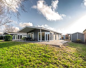 Vrijstaande woning in Breskens, Zeeuws-Vlaanderen, met ruime veranda en groene tuin. Perfect vakantiehuis in Zeeland voor ontspanning en natuurbeleving.