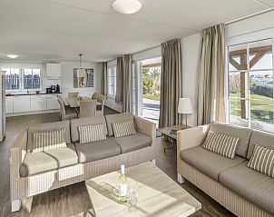 Cozy living room of Villa 10A in Cadzand-bad, Zeeuws-Vlaanderen. Enjoy the bright interior of this vacation home in Zeeland.