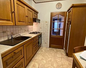 Kitchen with dining area in VZ730 Holiday home Cadzand-Bad, ideal for breakfast.
