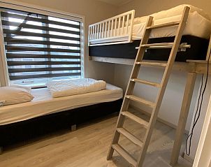 Children's room with bunk beds in VZ730 Holiday home Cadzand-Bad, ideal for families.