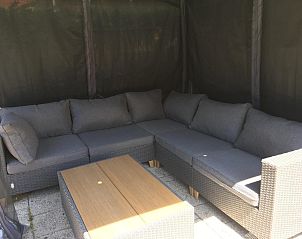 Cozy sitting area in the garden of VZ730 Holiday home Cadzand-Bad, Zeeuws-Vlaanderen.