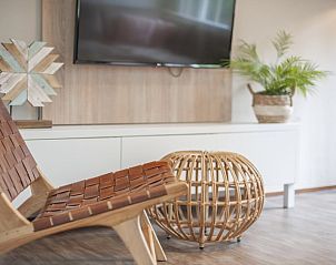 Stylish living room of Villa 8A Luxe in Cadzand-bad, Zeeuws-Vlaanderen, with modern interior and comfortable sitting area in vacation home.