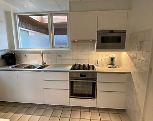 Badezimmer im Ferienhaus VZ920, Cadzand-Bad, mit Dusche und Waschmaschine.