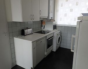 Compact kitchen with appliances in VZ922 Holiday apartment in Cadzand, perfect for self-catering vacations in Zealand.