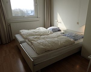 Bedroom with double beds in VZ922 Holiday apartment in Cadzand, offers comfort and tranquility in Zeeland.