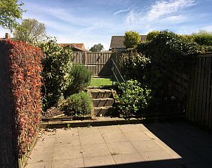 Backyard of VZ924 Holiday home in Cadzand with green surroundings in Cadzand-bad, Zeeland.