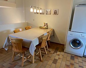 Kitchen and dining area in VZ924 Holiday home in Cadzand, Zeeuws-Vlaanderen, with modern amenities.