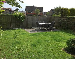 Terrace with garden furniture in VZ924 Holiday home in Cadzand, perfect for summer evenings in Zeeuws-Vlaanderen.