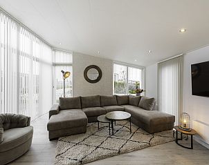 Comfortabele zithoek in Vakantiehuis Ruisweg 71, vakantiehuis in Wemeldinge, ideaal voor familietijd in Zeeland.