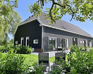 Vakantiehuis ZE1456 in Wemeldinge met zonnig terras en groene tuin in Zuid-Beveland, Zeeland.