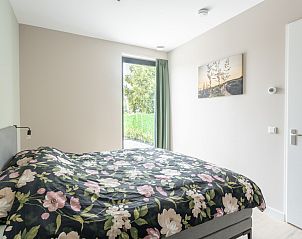 Trap naar bovenverdieping in vakantiehuis ZE1456 in Wemeldinge, Zuid-Beveland, Zeeland.