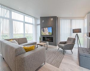 Gezellige zithoek met uitzicht in Vakantiehuis Waterresort Oosterschelde huisnr. 39 in Wemeldinge.