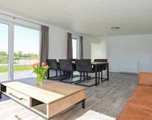 Gezellige zithoek in Vakantiehuis Hart van Zeeland, ideaal voor ontspanning in Heinkenszand.