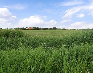Stijlvolle eetruimte in vakantiehuis ZE1420, Nieuwdorp, Zuid-Beveland, perfect voor gezellige maaltijden in Zeeland.