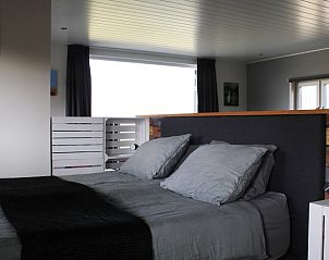 Comfortabele slaapkamer in Vakantiehuis in Stolwijk, rustgevend interieur in Alblasserwaard, Zuid-Holland.