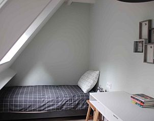 Gemtliche Veranda des Ferienhauses ZH330 in Ouddorp, ideal fr Mahlzeiten im Freien in Sdholland.