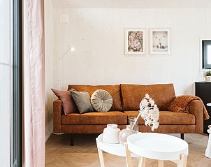 Stijlvolle zithoek in Scandic vakantiehuis in Ouddorp, Goeree-Overflakkee.