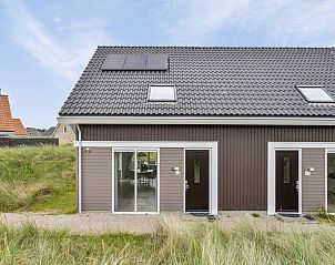 Reihenhaus in Ouddorp, ein Ferienhaus in Goeree-Overflakkee, Sdholland, umgeben von Dnen und Natur.