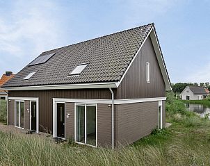 Reihenhaus in Ouddorp, Ferienhaus in Goeree-Overflakkee, Sdholland mit moderner Architektur und Blick auf die Natur.