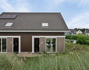 Reihenhaus in Ouddorp, Ferienhaus inmitten der Dnen in Ouddorp, Goeree-Overflakkee, Sdholland, mit natrlicher Umgebung.