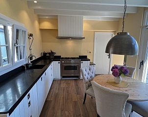 Attraktives Esszimmer in VZ1114 Ferienwohnung in Ouddorp, ideal fr Dinnerpartys.