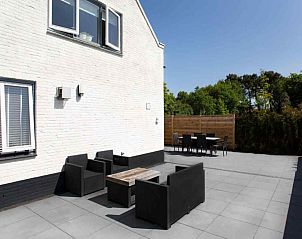 ZH022 vakantiewoning in Ouddorp omgeven door weelderige natuur, biedt rust en privacy in Zuid-Holland.