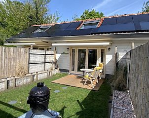 Ruhiger Garten im Ferienhaus VZ991 in Ouddorp, Goeree-Overflakkee, ideal zum Entspannen.