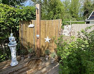 Saunahuschen im Garten von VZ991 Vakantiewoning in Ouddorp, Sdholland.