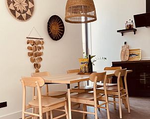 Dining Room in Cottage in Ouddorp, a vacation home in Goeree-Overflakkee, South Holland with stylish decor.