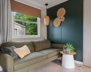 Stylish living room in Mobil home Grevelingen, Ouddorp, South Holland, offers comfort and relaxation on Goeree-Overflakkee.