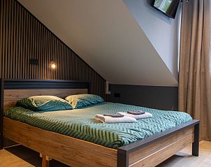 Comfortabele slaapkamer in ZH415 vakantiehuis, Ouddorp, Zuid-Holland met moderne inrichting.