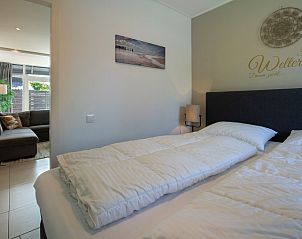 Attraktives Schlafzimmer mit Doppelbett im Ferienhaus De Toekomst 107 'Sista' in Ouddorp, ideal fr Erholung.