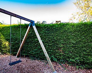 Schaukel im Garten des Ferienhauses De Toekomst 126 Beachgarden in Ouddorp, ideal fr Kinder.