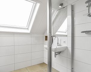 Komfortables Schlafzimmer in der Villa Strand Resort Ouddorp Duin, Sdholland.